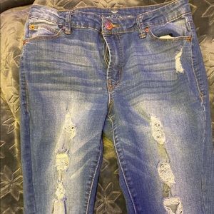 Blue ripped skinny jeans